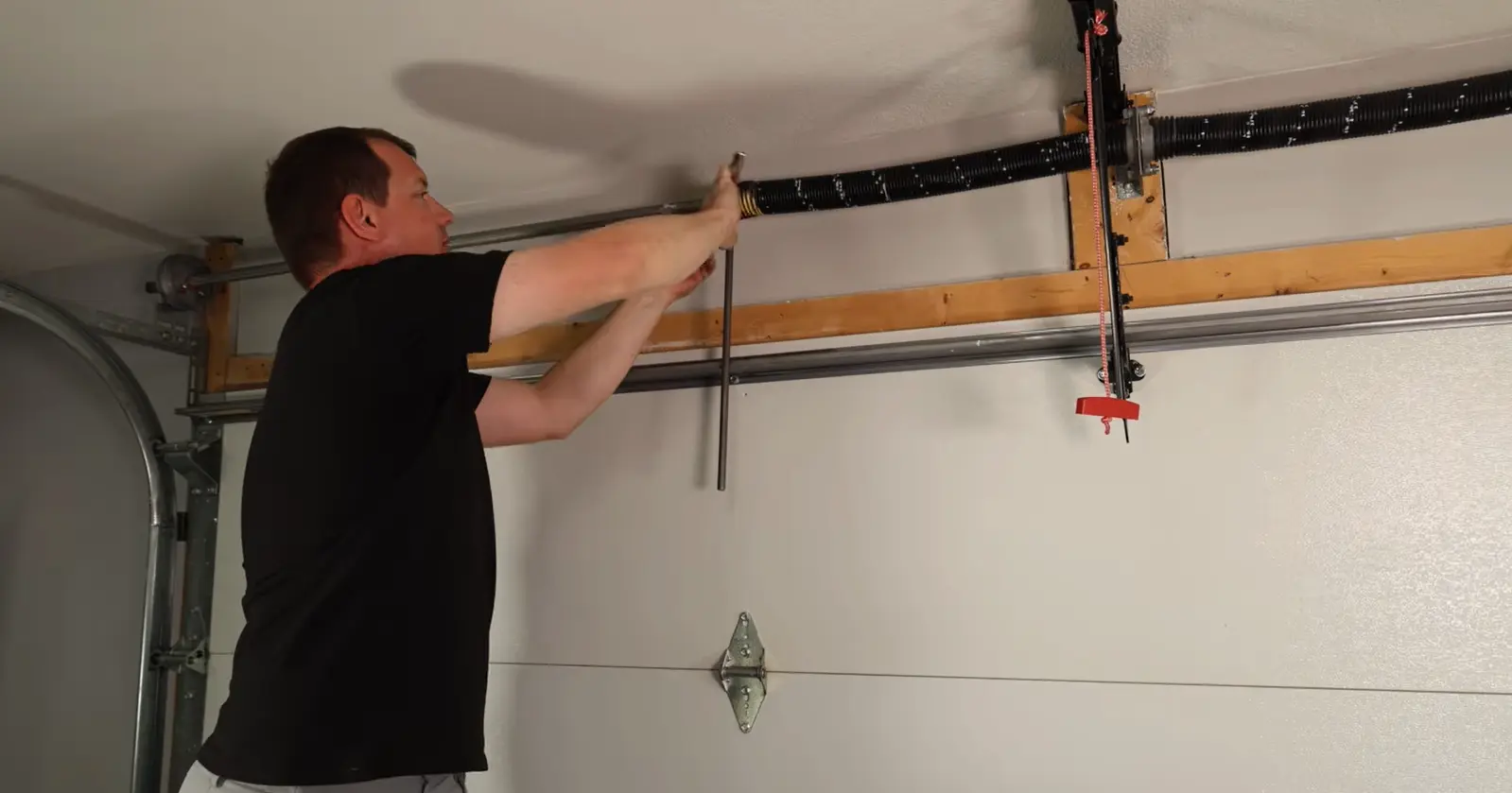 Broken garage door spring repair in Tuscaloosa